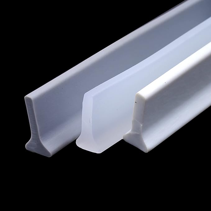 Self-Adhesive Bathroom Water Retaining Strip – Transparent Silicone Shower Water Barrier Threshold Seal for Bathroom, Kitchen Countertops & Bathtubs (1.6 × 3 × 100cm)